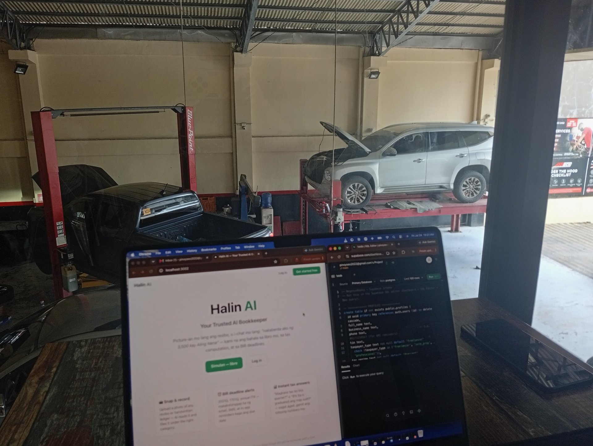 Laptop showing HalinAI.ph with the Montero up on the lift at Motech Iligan City