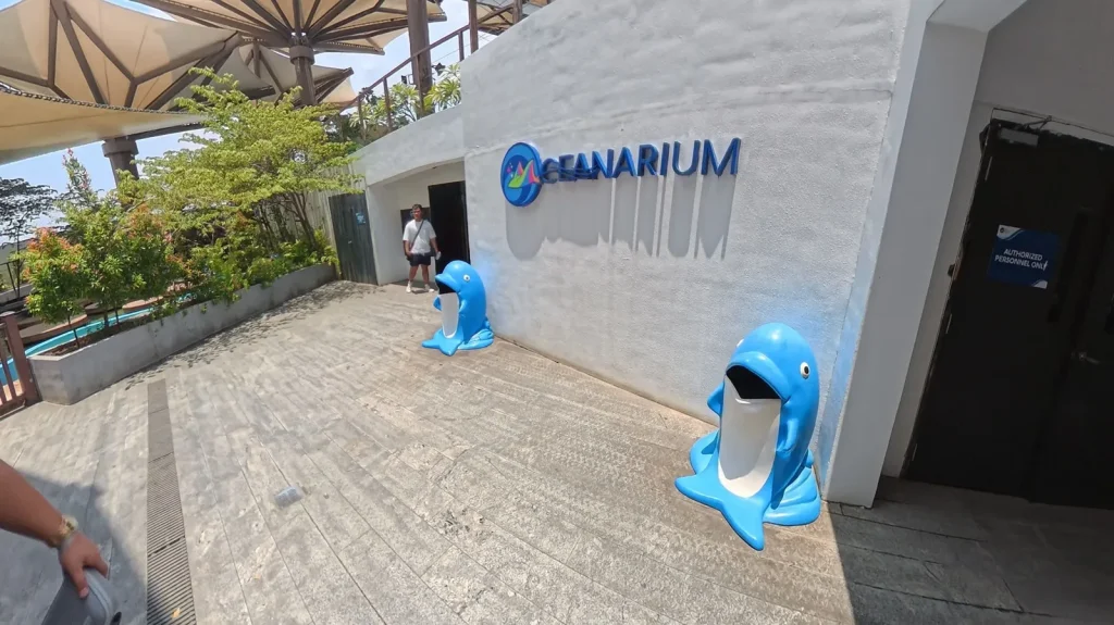 Oceanarium entrance with dolphin statues at Cebu Ocean Park