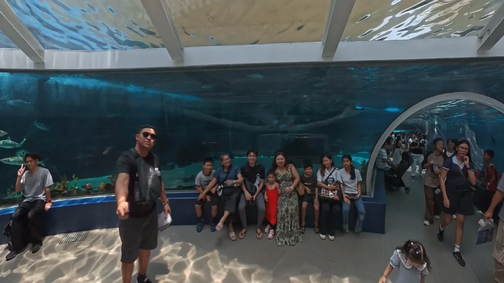 The Montero Guy family inside the main tank gallery at Cebu Ocean Park